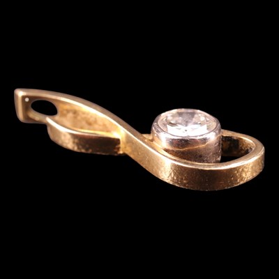 Lot 1486 - A contemporary diamond and 18 ct gold scroll...