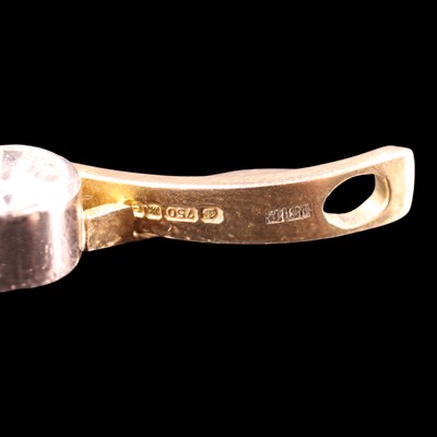 Lot 1486 - A contemporary diamond and 18 ct gold scroll...