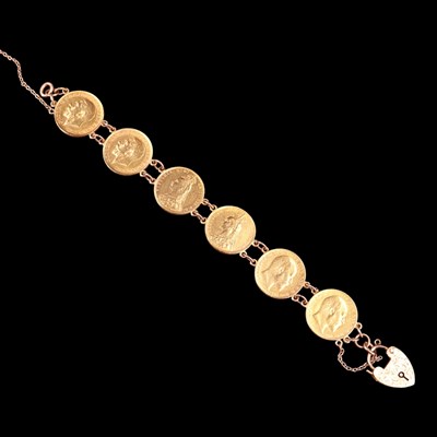 Lot 1613 - Six gold sovereigns hard mounted in bracelet...