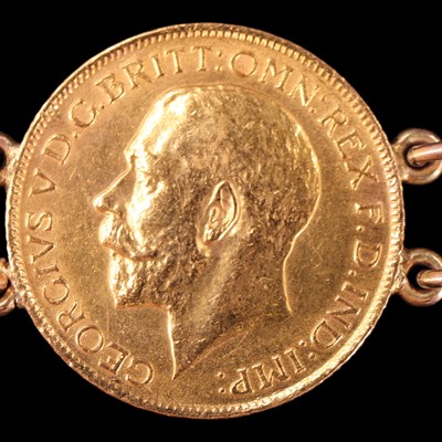 Lot 1613 - Six gold sovereigns hard mounted in bracelet...