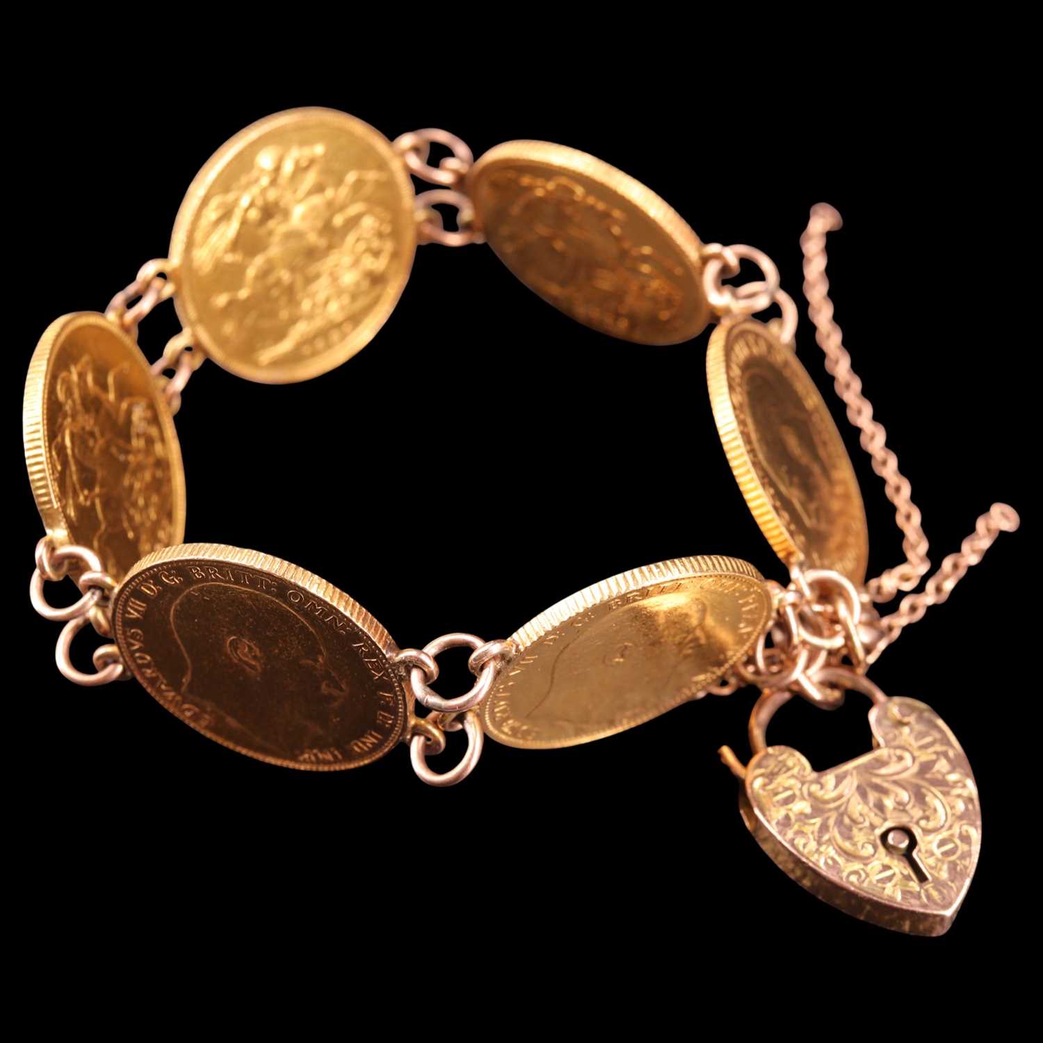 Lot 1613 - Six gold sovereigns hard mounted in bracelet...