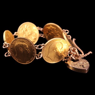 Lot 1613 - Six gold sovereigns hard mounted in bracelet...