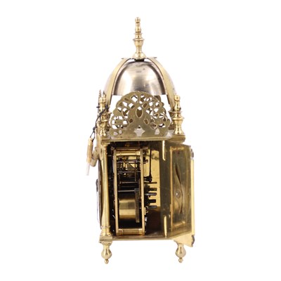 Lot 1673 - A miniature "lantern" clock, circa 1930s, 23 cm