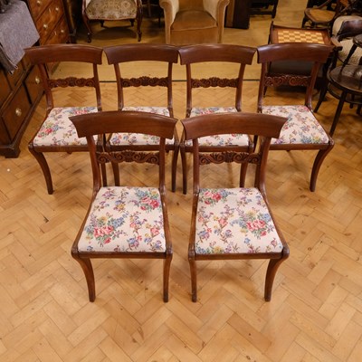 Lot 1187 - A set of six George IV mahogany sabre-legged...