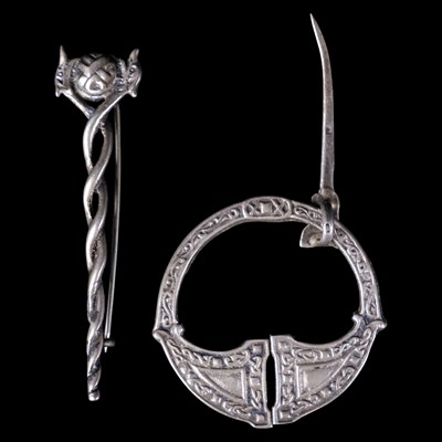 Lot 1214 - A 1940s silver Celtic penannular brooch...