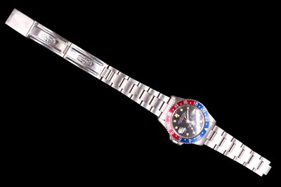 Lot 1124 - A Rolex Oyster Perpetual GMT-Master wristwatch,...