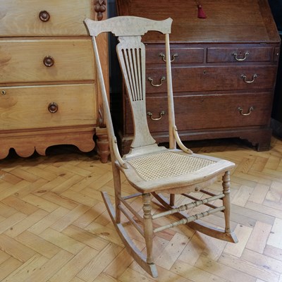Lot 1601 - A Victorian cane-seated rocking chair,...