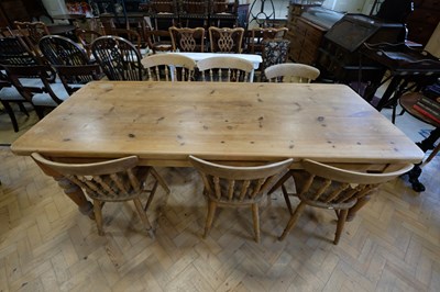 Lot 1609 - A good farmhouse pine dining suite, comprising...