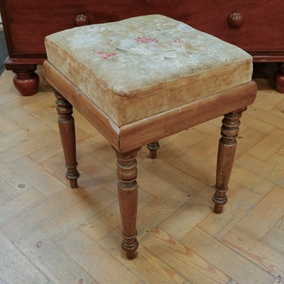 Lot 1602 - A Victorian walnut stool, having a period...