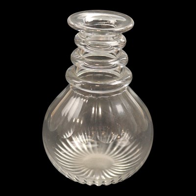 Lot 1143 - A George III glass carafe, having triple neck...