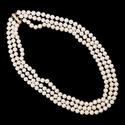 Lot 1242 - A vintage triple-strand pearl necklace, the...