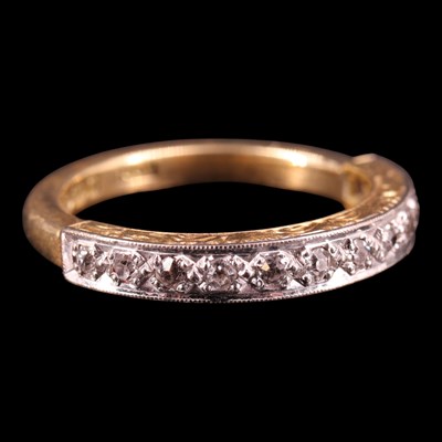 Lot 1244 - A mid 1930s diamond half-hoop eternity ring,...