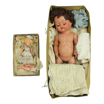 Lot 910 - A mid-20th Century "G&S" composition doll and...