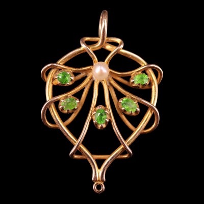 Lot 1261 - A vintage peridot and pearl openwork...