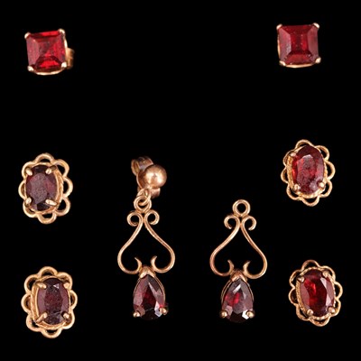 Lot 1218 - Four pairs of vintage garnet-set stud and...