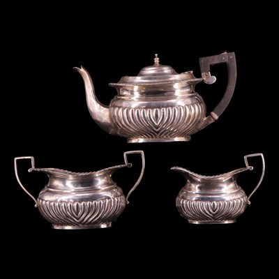 Lot 1168 - A late Victorian silver three-piece tea set,...