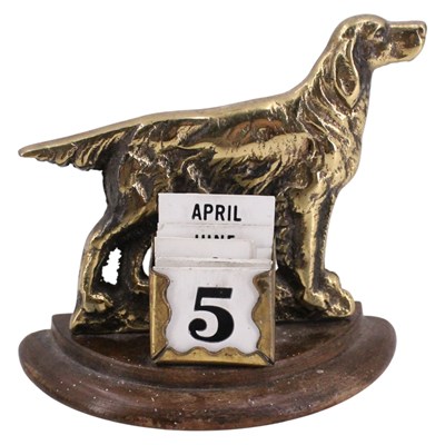 Lot 658 - A vintage brass Irish Setter perpetual desk...