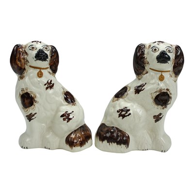 Lot 1045 - A pair of Victorian Staffordshire pottery...