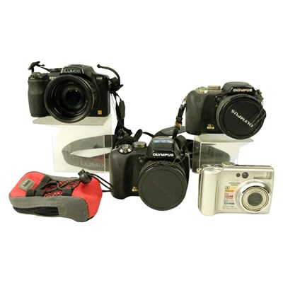 Lot 801 - Four digital cameras, comprising a Nikon...