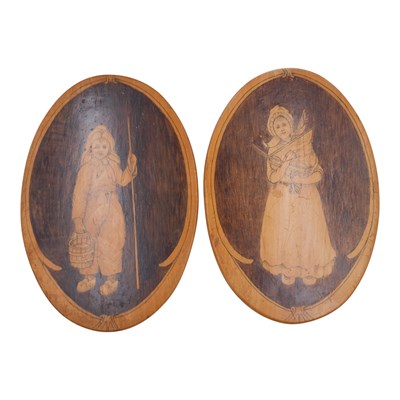 Lot 977 - A pair of continental oval folk art treen...