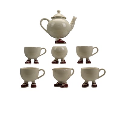 Lot 1100 - A vintage ceramic "walking" teaset in the...