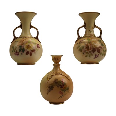 Lot 1055 - A pair of Carlton Ware "blush ivory" vases,...