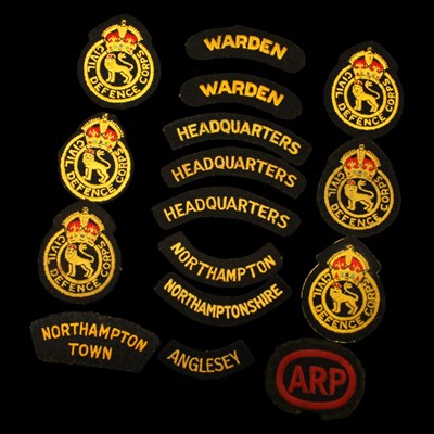 Lot 185 - A group of Civil Defence cloth insignia and...