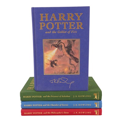 Lot 510 - J K Rowling, Harry Potter Deluxe Edition...