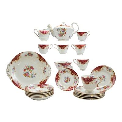 Lot 1102 - A Paragon "Rockingham" pattern tea service for...
