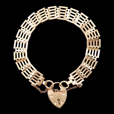 Lot 1277 - A mid 1960s 9 ct gold gate-link bracelet, 16...
