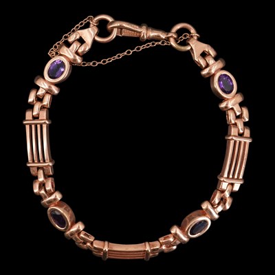 Lot 1278 - A mid 1990s amethyst and 9 ct rose-gold...