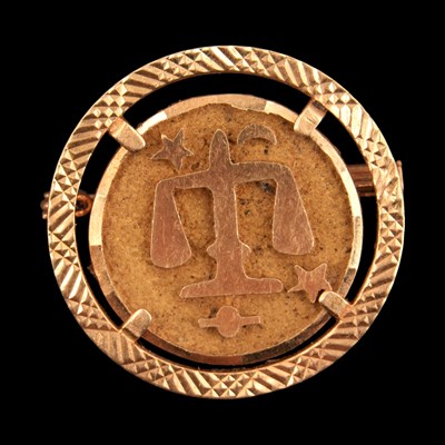 Lot 1283 - A vintage Zodiacal Libra 18 ct yellow metal...