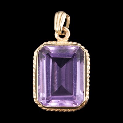 Lot 1286 - A mid 1990s amethyst and 9 ct gold...