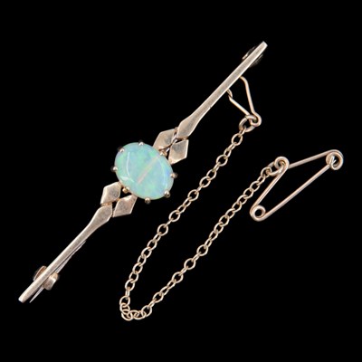 Lot 1288 - A 1990 opal and 9 ct gold bar...