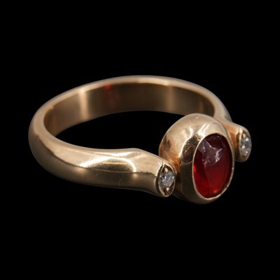 Lot 1294 - A near-contemporary three-stone garnet and...