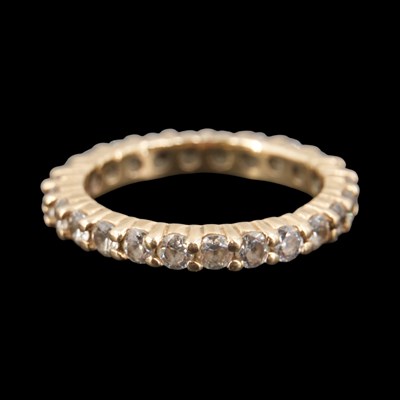 Lot 1297 - A contemporary white gemstone-set eternity...