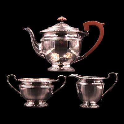 Lot 1180 - A George VI three-piece silver tea set, Barker...