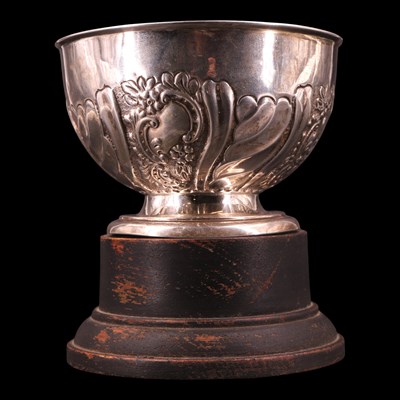 Lot 1181 - An Edwardian relief-decorated silver bowl on a...
