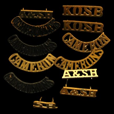 Lot 181 - A group of Scottish regiment brass shoulder...