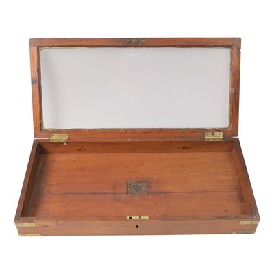 Lot 995 - A late 19th Century glass-topped mahogany...