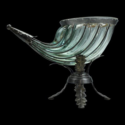 Lot 1147 - A near-contemporary wrought metal and glass...