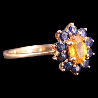Lot 1306 - A contemporary yellow and blue sapphire...
