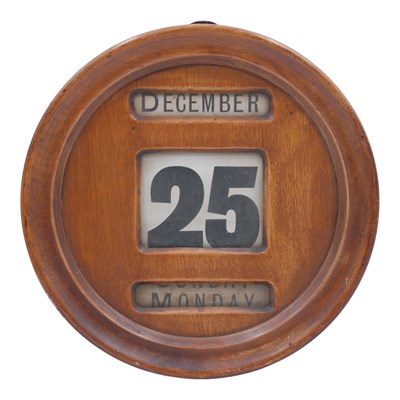 Lot 973 - A 1920s to 1930s oak-framed perpetual wall...