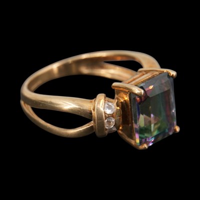 Lot 1314 - A contemporary topaz ring, comprising an...