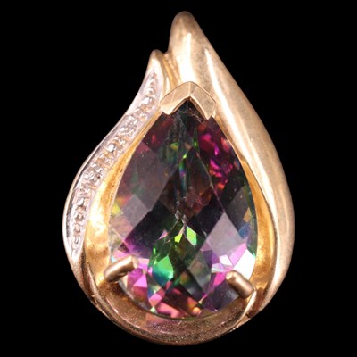 Lot 1320 - A contemporary topaz and diamond pendant, of...