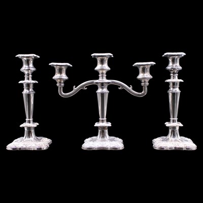 Lot 1202 - A Georgian-style electroplate candlestick...