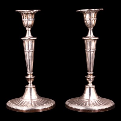 Lot 1182 - A pair of Edwardian neo-classical weighted...