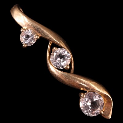 Lot 1321 - A contemporary three-stone white topaz...