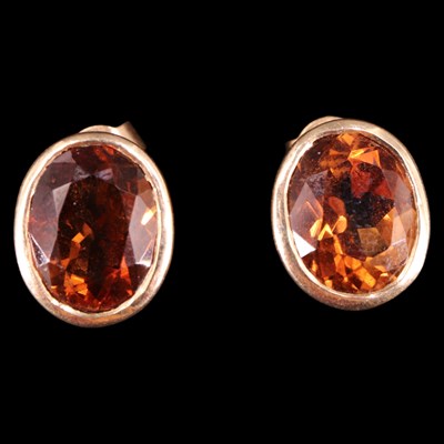 Lot 1323 - A pair of contemporary topaz and 9 ct gold...