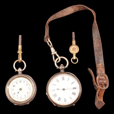 Lot 1487 - An early 20th Century white metal fob watch on...